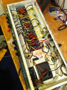 Looking down the chassis. Various cathode bypass capacitors were replaced as well as the 470 ohm screen grid resistors. One measured 390 ohms and the other was 712 ohms. There is a bias trimpot attached to the hum balance pot installed by some previous tech visible just to the left of the upside down 
