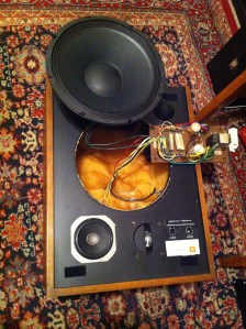 Upside down view of the awesome JBL L-65 home stereo speaker enclosure. I tried rotating it upright but the picture becomes very disorienting so oh well. I got a pair of these old JBLs in for repair and seems like they're kind of coveted -- a pair still sells these days for around $1000-2000. Unfortunately both of the 12