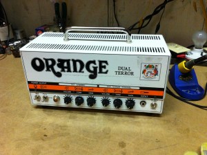 Orange Dual Terror just had a broken input jack. This amp is switch-able for 7, 15, or 30W and it sounds pretty nice. As far as I know, it is basically just the big brother of the Tiny Terror, having two channels rather than one and having four EL84s in the output section for 30W instead of 15W for the Tiny Terror, which only has two EL84s
