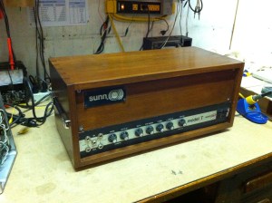 Re-housed 1st generation Sunn Model T from 1973. This is one of the loudest guitar amps ever. It uses an ultralinear output transformer because the output section is modeled after a Dynaco Mark III, meaning that the screen grid supply is fed through the output transformer as well as the B+ voltage -- the output transformer is a dual primary, one for the B+ and the other for the screen grid. Because the screen grid supply and the B+ come from the same power supply node their voltage fluctuates up and down under load together. This connection provides some feedback between the anode and screen grid and has been found to to act in a way that is between pure pentode mode and pure triode mode, with lower distortion than either.