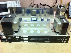 There is no information available This is from the Dave Green era of Matamps which is I believe the 1990s. Mirrored image on the back of the front panel shows four blue power supply caps. They are shielded from the power tubes just like in the old Sound City's. In front of them are the two preamp tubes (right), the choke, and the left most tube is the phase inverter. Power switch on the back is for half power -- it shuts off two of the power tubes. I would usually not go into such detail as per the layout and inner workings of an amp, but since there is no service information or schematic available I have decided to do so in case it might help someone. Plate voltage was 482V with a bias setting of ~34mA.