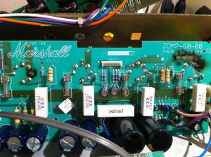 And a shot showing the four PCB mount power tube sockets. The two pin 3's that connect directly to the output transformer are burnt off the board and the solder that as once there is now just a vaporized remnant.