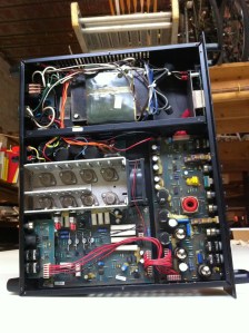 Ampeg SVT-III, not the SVT-III Pro. This amp is similar to the SVT-II in preamp but the power amp is solid state. Output transistors are mounted to the heatsink and are in the old school TO-3 package. These ones are MJ15023/MJ15022. Preamp is up front with three 12AX7s and the output section and power supply are towards the rear.