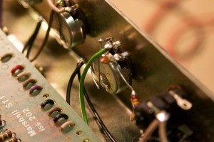 Broken connection on the ground buss wire for the preamp volume pot.